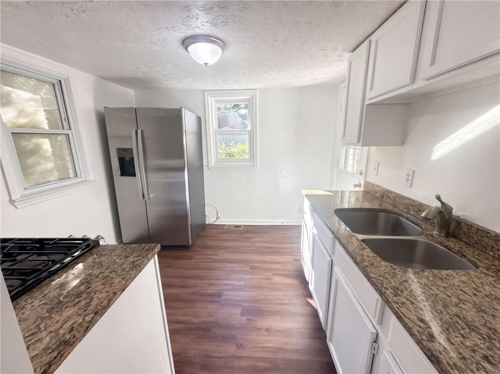 2 bedroom, 1 bathroom, 1,019 sq ft single family residence for sale at 427 Wellons Street, Marietta, GA 30060 — photo 2