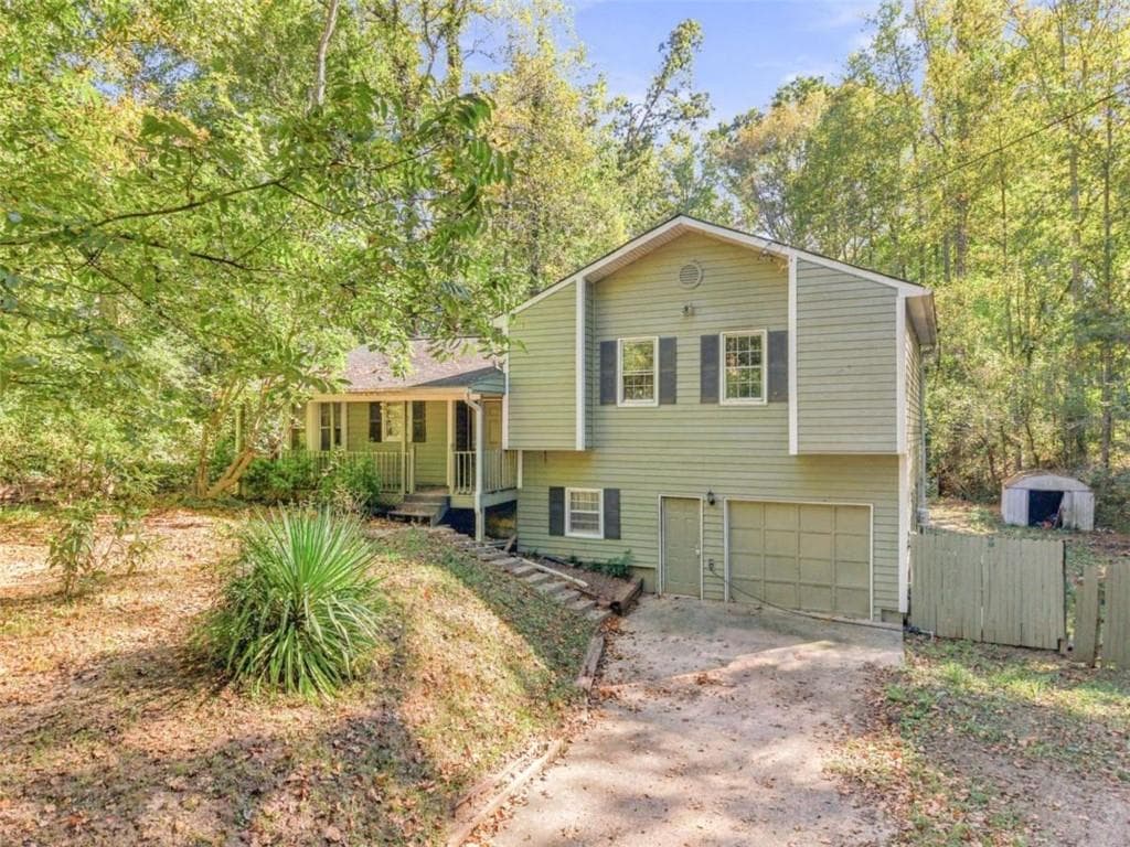 5 bedroom, 2 bathroom, 1,322 sq ft single family residence for sale at 615 Charity Lane, Mableton, GA 30126