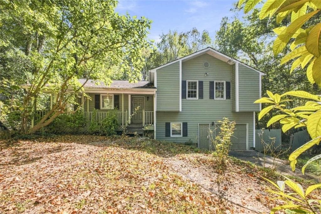 5 bedroom, 2 bathroom, 1,322 sq ft single family residence for sale at 615 Charity Lane, Mableton, GA 30126 — photo 2