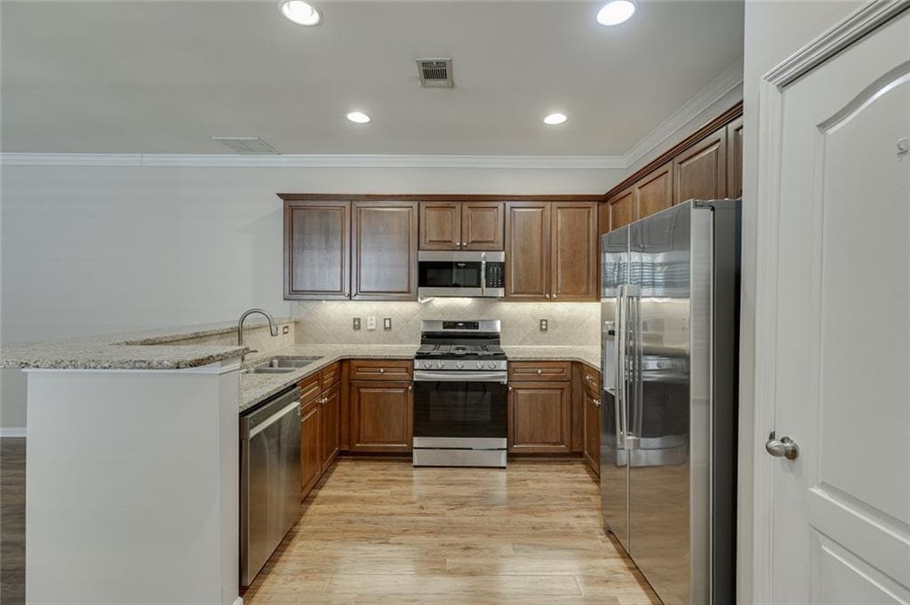 3 bedroom, 4 bathroom, 2,432 sq ft townhouse for sale at 1102 Firethorne Pass, Cumming, GA 30040 — photo 6