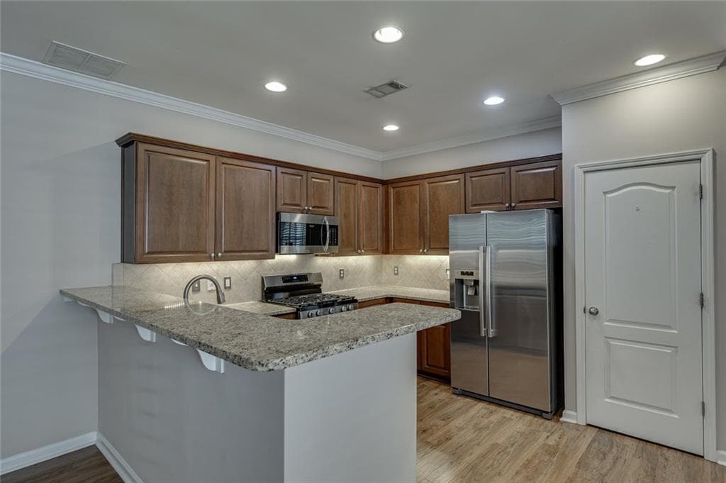 3 bedroom, 4 bathroom, 2,432 sq ft townhouse for sale at 1102 Firethorne Pass, Cumming, GA 30040 — photo 7