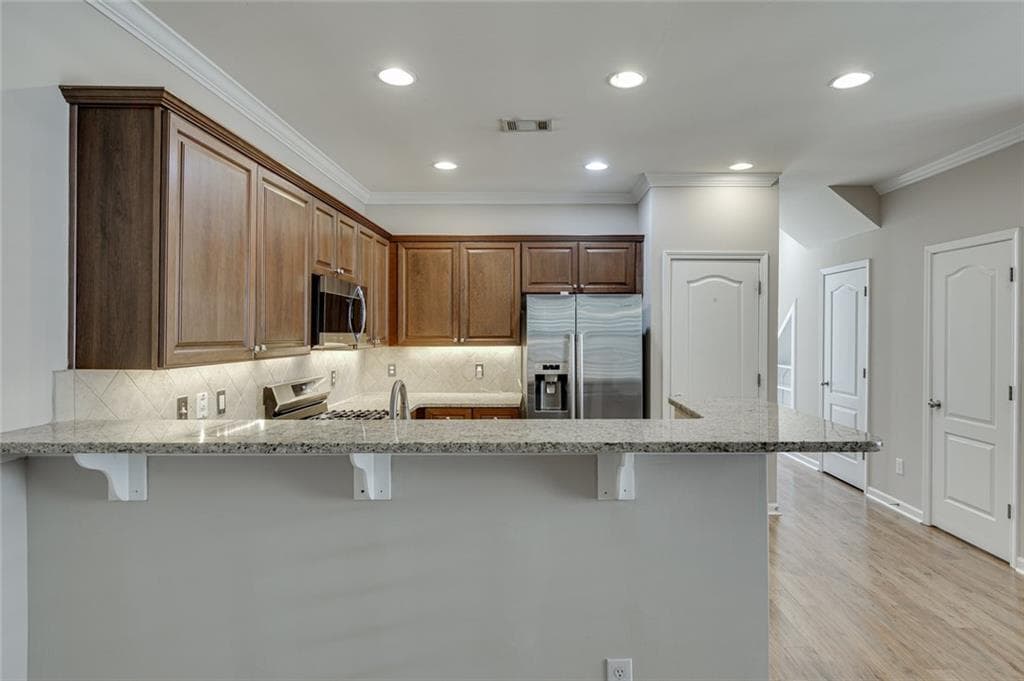 3 bedroom, 4 bathroom, 2,432 sq ft townhouse for sale at 1102 Firethorne Pass, Cumming, GA 30040 — photo 8