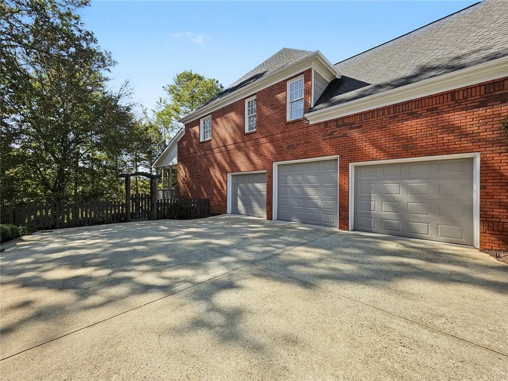6 bedroom, 6 bathroom, 5,683 sq ft single family residence for sale at 206 White Oak Drive, Canton, GA 30114 — photo 2
