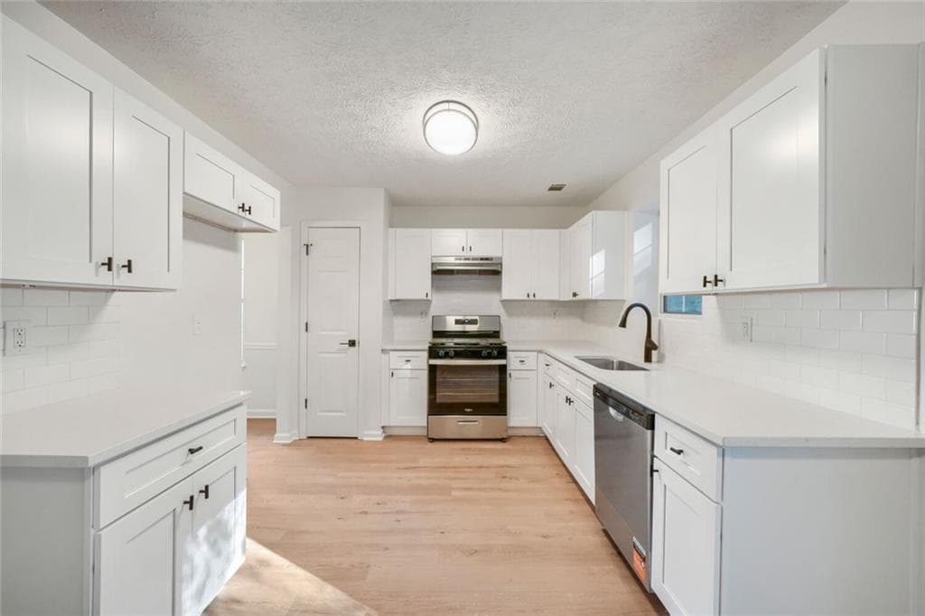 3 bedroom, 3 bathroom, 2,000 sq ft single family residence for sale at 7562 Broadhurst Drive, Riverdale, GA 30296 — photo 6