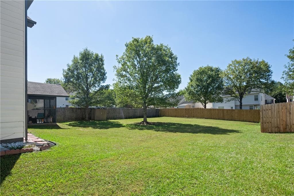 3 bedroom, 3 bathroom, 2,057 sq ft single family residence for sale at 1411 Kala Drive, Lithonia, GA 30058 — photo 2