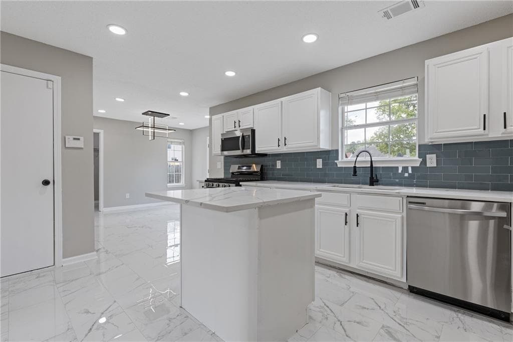 3 bedroom, 3 bathroom, 2,057 sq ft single family residence for sale at 1411 Kala Drive, Lithonia, GA 30058 — photo 7