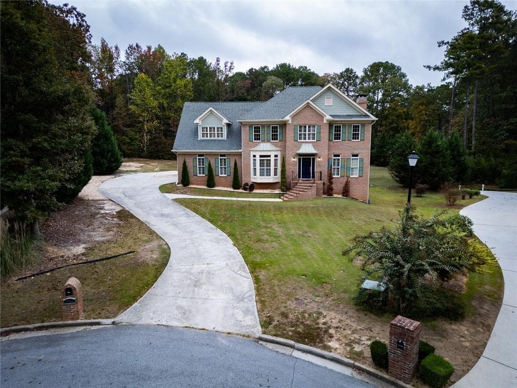 4 bedroom, 5 bathroom, 5,077 sq ft single family residence for rent at 1710 Winding Creek, Snellville, GA 30078 for $4,100 a month — photo 1 of 50