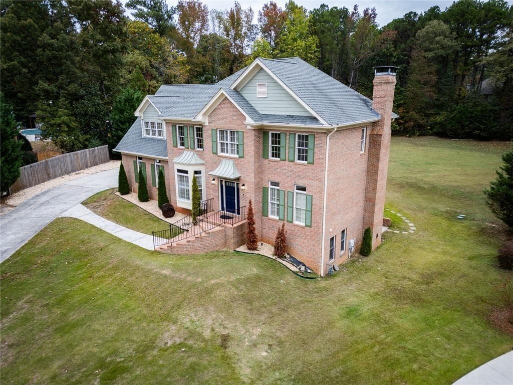 4 bedroom, 5 bathroom, 5,077 sq ft single family residence for rent at 1710 Winding Creek, Snellville, GA 30078 for $4,100 a month — photo 2