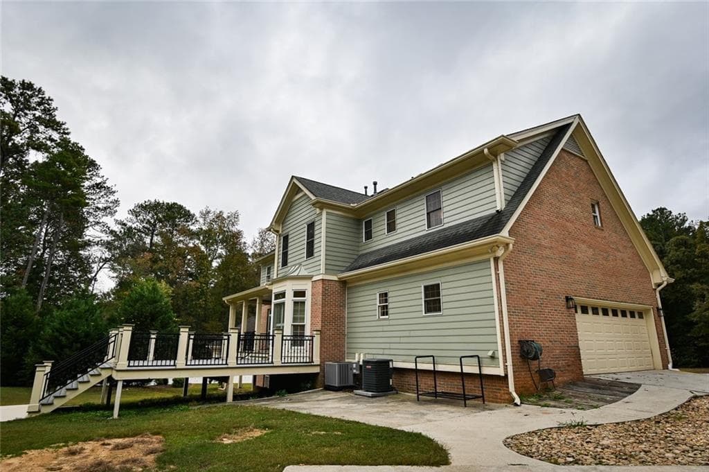 4 bedroom, 5 bathroom, 5,077 sq ft single family residence for rent at 1710 Winding Creek, Snellville, GA 30078 for $4,100 a month — photo 5