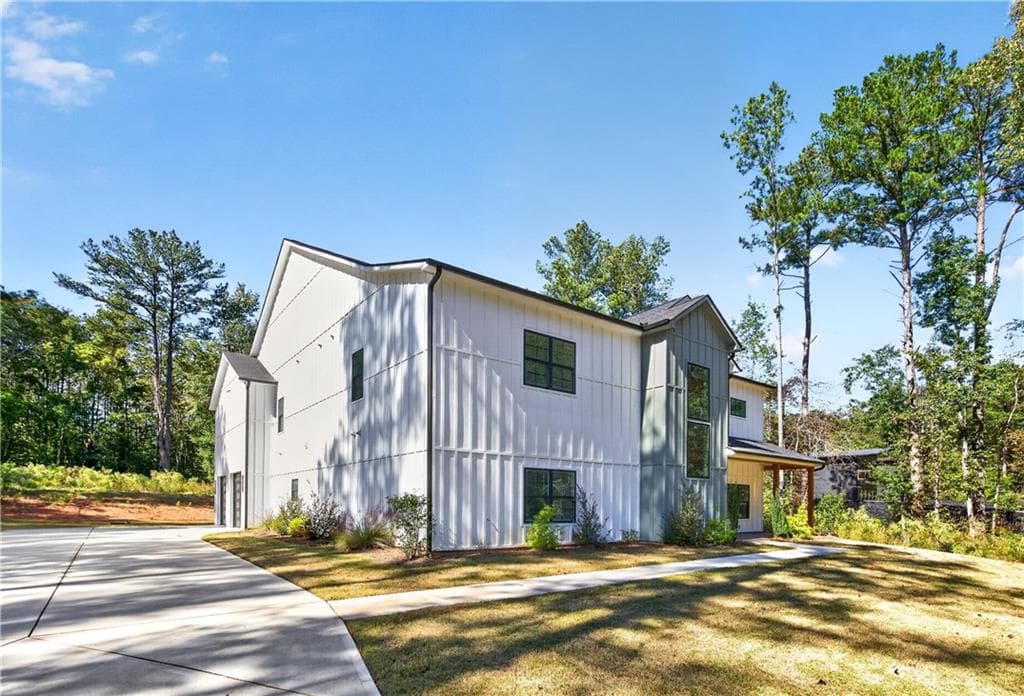 7 bedroom, 9 bathroom, 6,625 sq ft single family residence for sale at 140 Wesley Place, Fayetteville, GA 30214 — photo 4