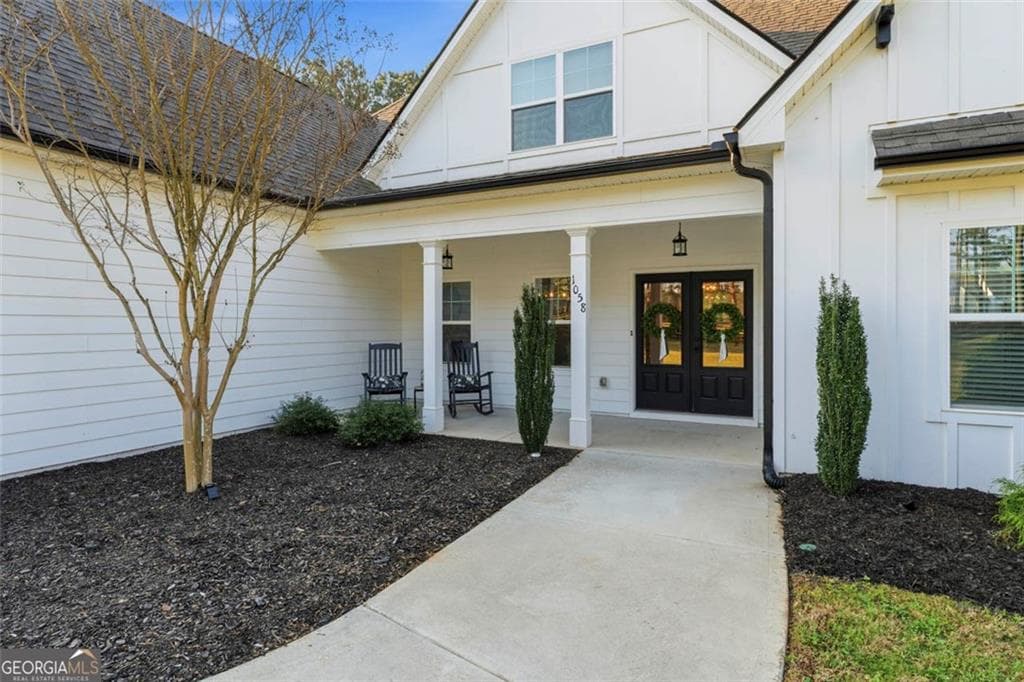 5 bedroom, 4 bathroom, 3,749 sq ft single family residence for sale at 1058 Lawshe Road, Senoia, GA 30276 — photo 2