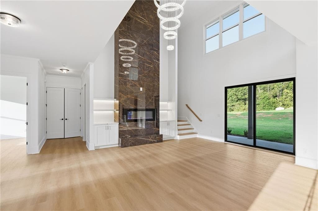 4 bedroom, 5 bathroom, 4,825 sq ft single family residence for sale at 8645 MILLWATER LN Road, Cumming, GA 30041 — photo 4