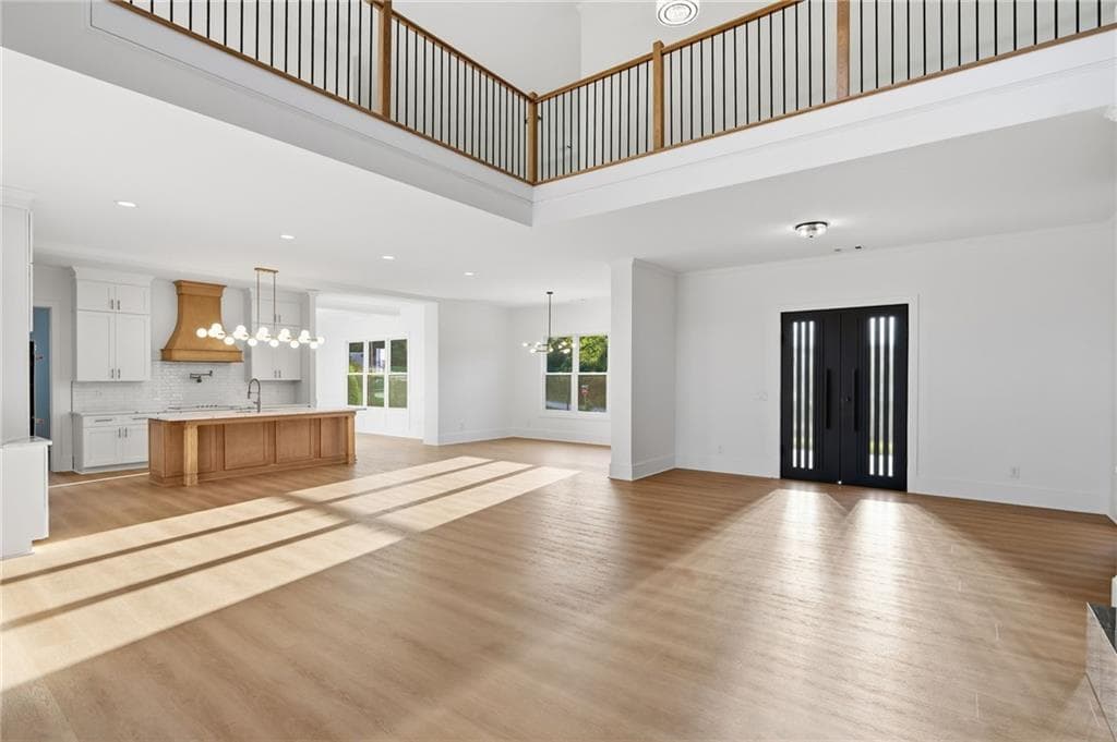 4 bedroom, 5 bathroom, 4,825 sq ft single family residence for sale at 8645 MILLWATER LN Road, Cumming, GA 30041 — photo 6