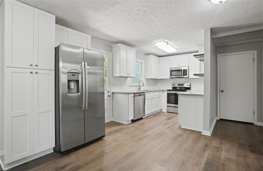 4 bedroom, 2 bathroom, 1,805 sq ft single family residence for rent at 703 Navaho Court, Woodstock, GA 30188 for $2,400 a month — photo 3