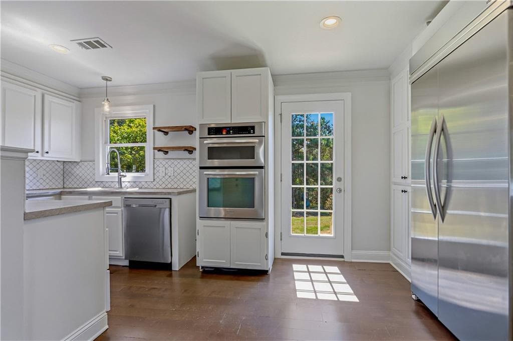 3 bedroom, 2 bathroom, 962 sq ft single family residence for sale at 3841 Lavilla Drive, Powder Springs, GA 30127 — photo 2