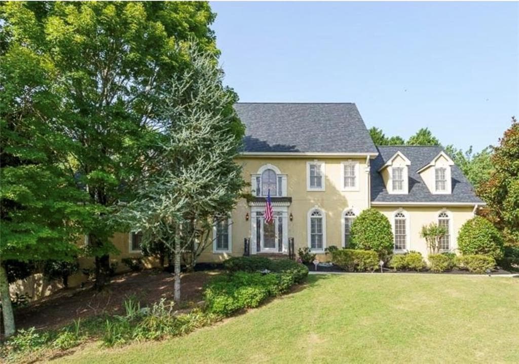 6 bedroom, 5 bathroom, 5,641 sq ft single family residence for sale at 1357 Baniff Court, Snellville, GA 30078