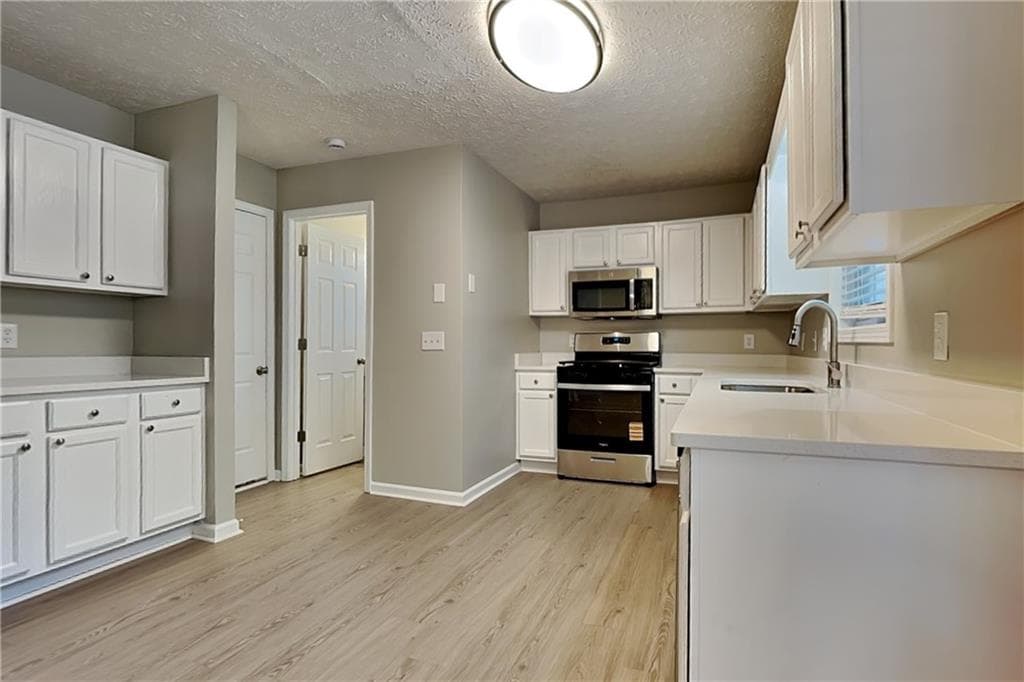 4 bedroom, 3 bathroom, 2,118 sq ft single family residence for rent at 3190 Wrenwood Court, Loganville, GA 30052 for $2,350 a month — photo 4