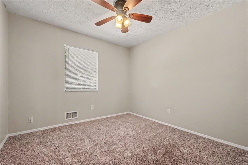3 bedroom, 3 bathroom, 1,302 sq ft single family residence for sale at 6915 Cainwood Drive, Atlanta, GA 30349 — photo 9