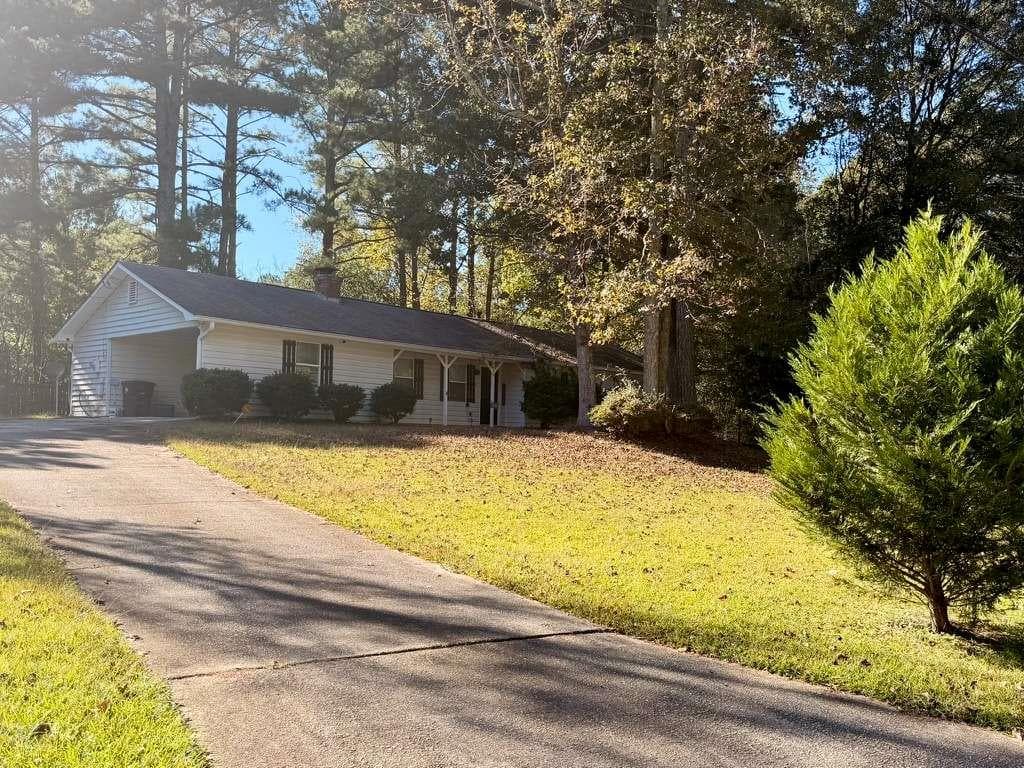 3 bedroom, 2 bathroom, 1,180 sq ft single family residence for sale at 3465 Stallion Court, Powder Springs, GA 30127 — photo 2