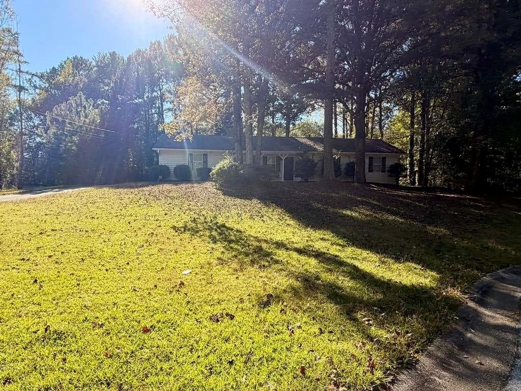 3 bedroom, 2 bathroom, 1,180 sq ft single family residence for sale at 3465 Stallion Court, Powder Springs, GA 30127 — photo 3