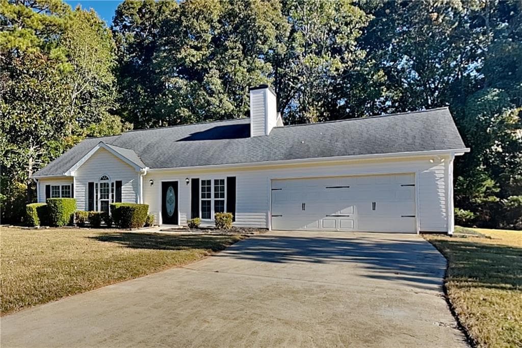 3 bedroom, 2 bathroom, 1,437 sq ft single family residence for rent at 1022 Carriage Way, Loganville, GA 30052 for $1,850 a month — photo 1 of 19