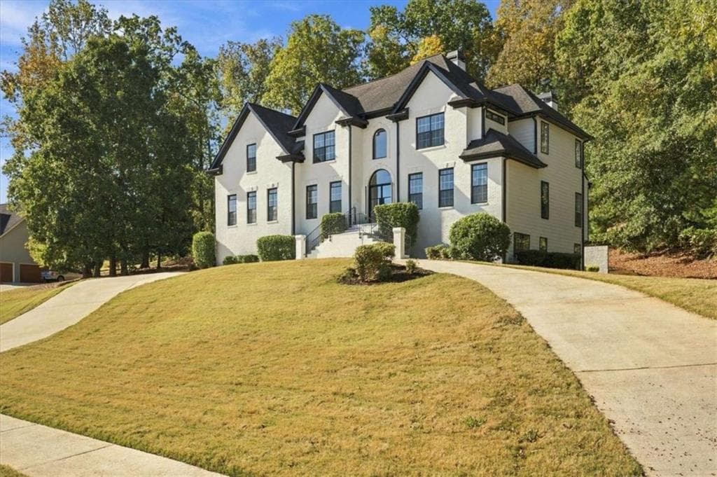 6 bedroom, 5 bathroom, 3,682 sq ft single family residence for sale at 100 James Ridge Drive, Stockbridge, GA 30281 — photo 2