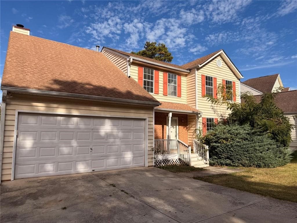 4 bedroom, 3 bathroom, 2,144 sq ft single family residence for sale at 6450 Alford Way, Lithonia, GA 30058 — photo 2