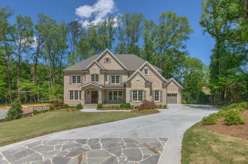 5 bedroom, 5,500 sq ft single family residence sold at 164 Lake Forrest Lane, Atlanta, GA 30342