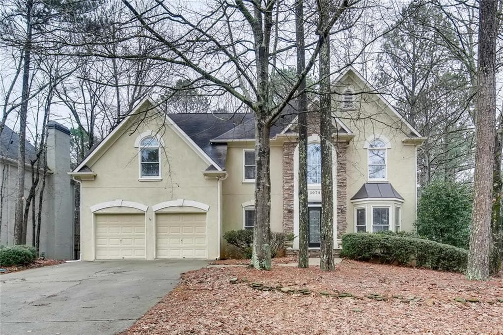 5 bedroom, 4 bathroom, 4,074 sq ft single family residence sold at 1074 Longwood Drive, Woodstock, GA 30189