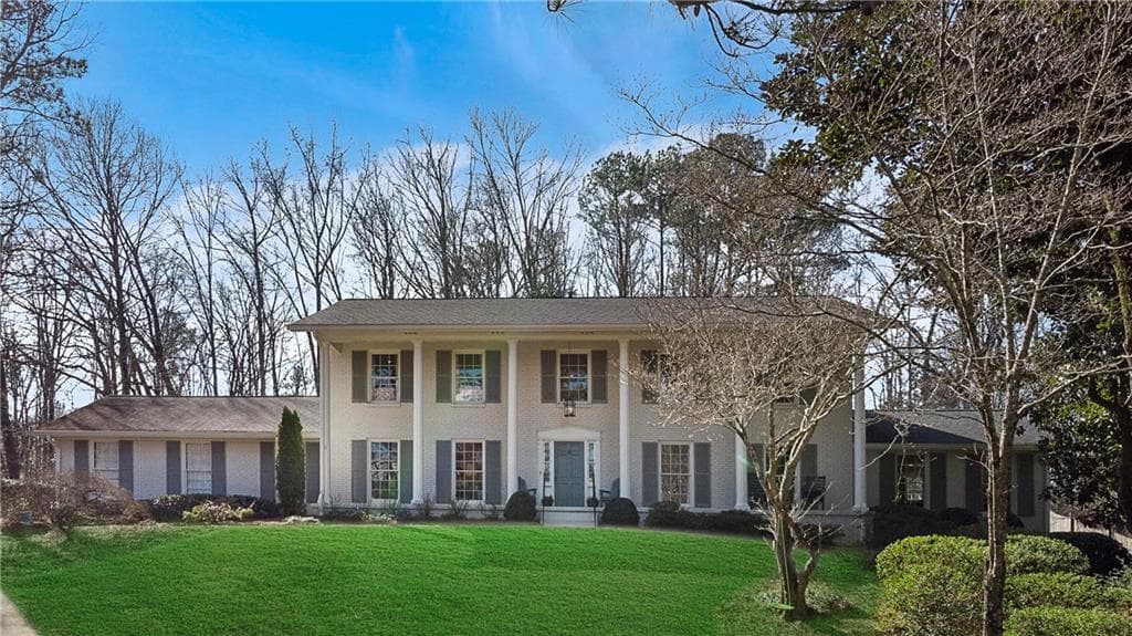 6 bedroom, 5 bathroom, 6,075 sq ft single family residence sold at 6120 Riverwood Drive, Atlanta, GA 30328