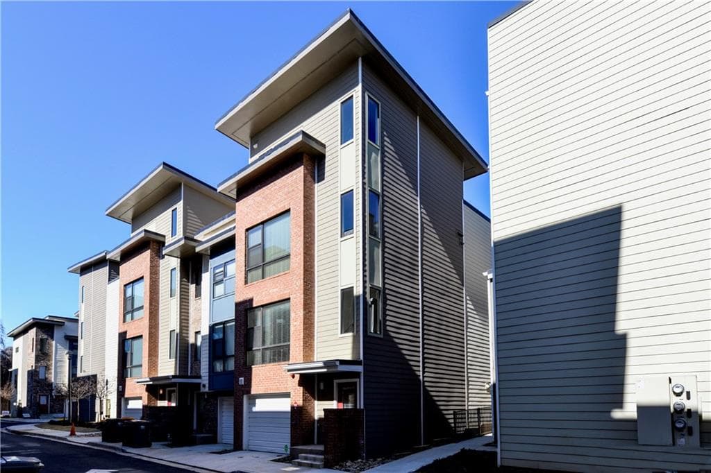 3 bedroom, 4 bathroom, 1,995 sq ft townhouse sold at 990 Moda Drive, Atlanta, GA 30316
