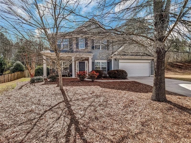 4 bedroom, 3 bathroom, 2,268 sq ft single family residence sold at 6630 Grove Crossing Court, Cumming, GA 30028