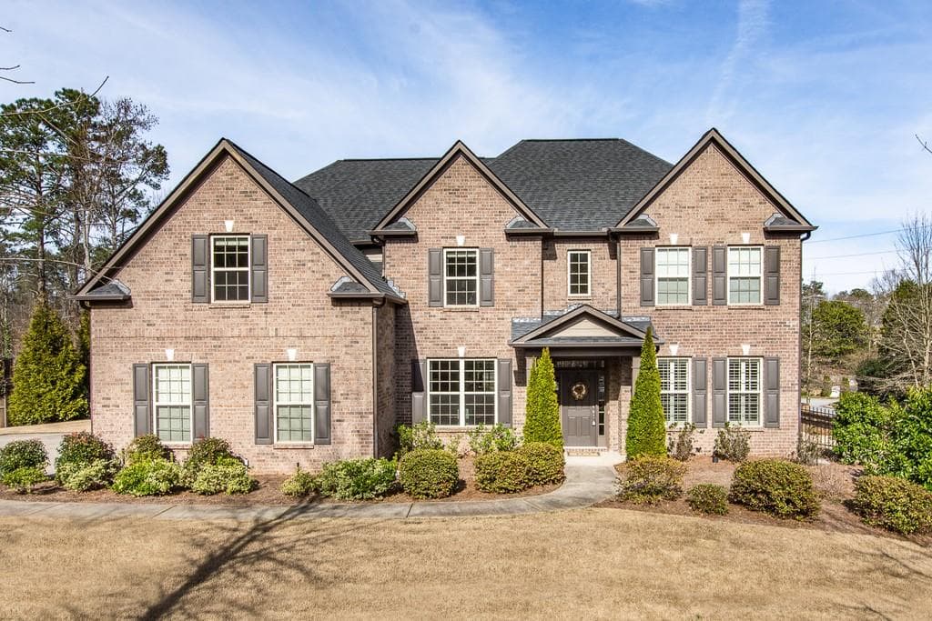 5 bedroom, 4 bathroom, 3,998 sq ft single family residence sold at 1010 Ashley Manor Drive, Roswell, GA 30075