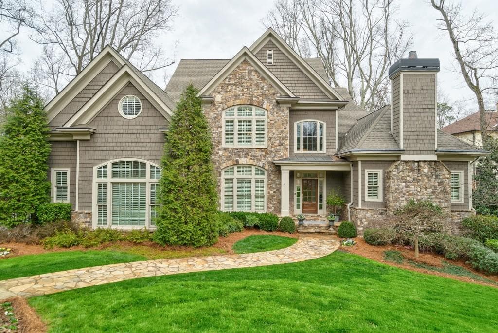 5 bedroom, 8 bathroom, 6,299 sq ft single family residence sold at 4915 Powers Ferry Road, Atlanta, GA 30327