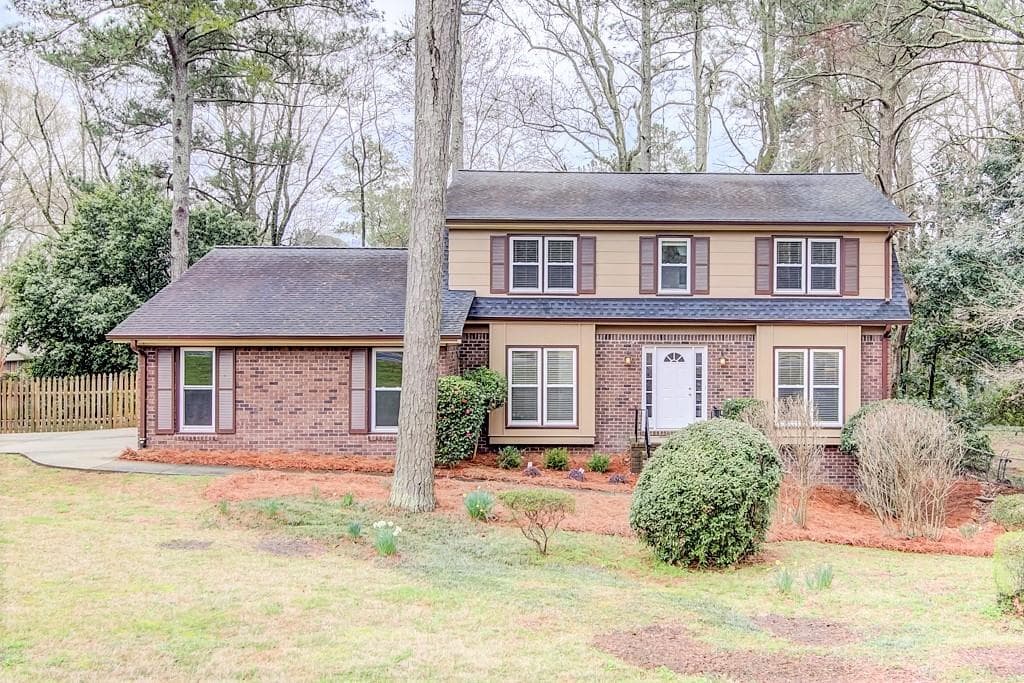 5 bedroom, 3 bathroom, 2,250 sq ft single family residence sold at 1461 Womack Road, Dunwoody, GA 30338