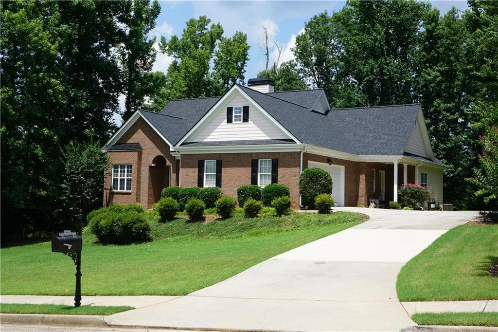 5 bedroom, 4 bathroom single family residence sold at 1065 Chateau Forest Road, Hoschton, GA 30548