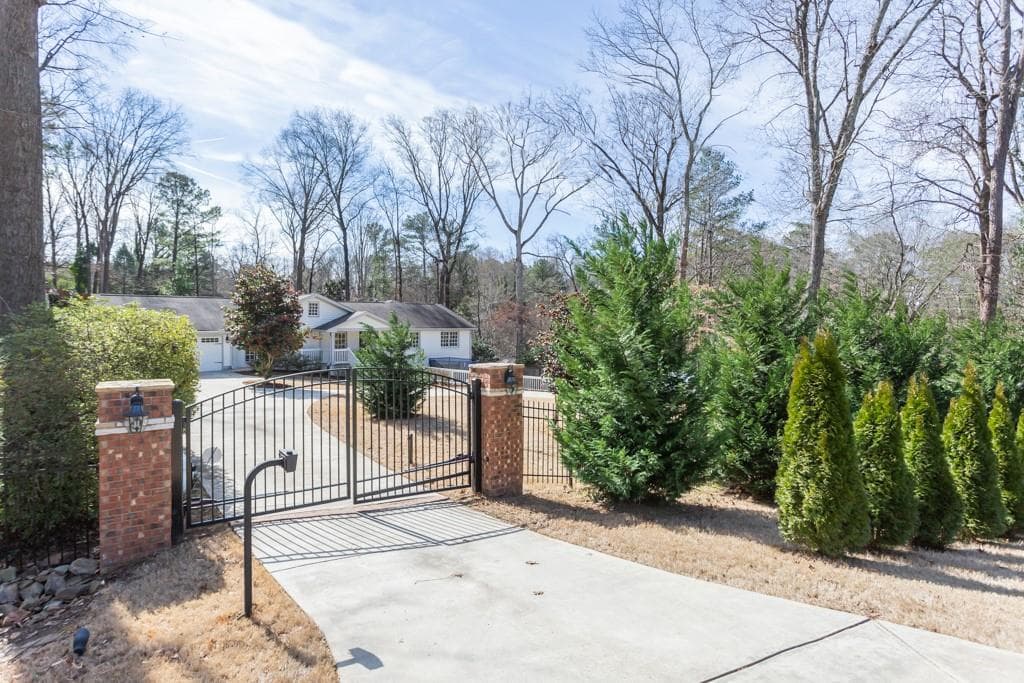 6 bedroom, 4 bathroom, 4,725 sq ft single family residence sold at 1475 Harts Mill Road, Brookhaven, GA 30319 — photo 1 of 1