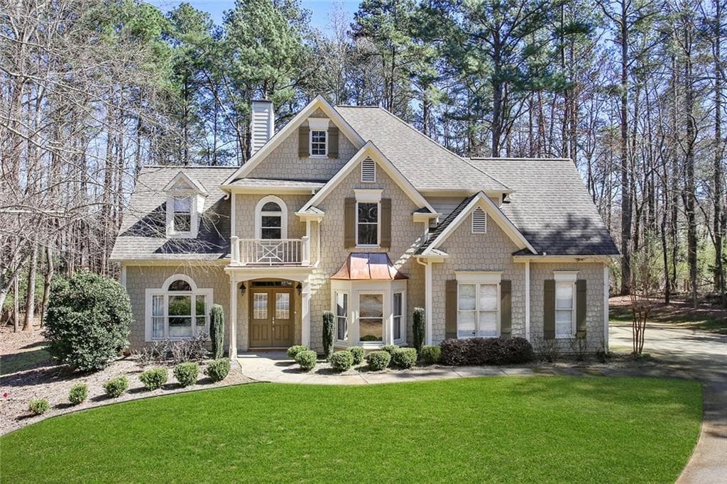 5 bedroom, 3 bathroom, 2,450 sq ft single family residence sold at 1315 Poplar Grove Lane, Cumming, GA 30041