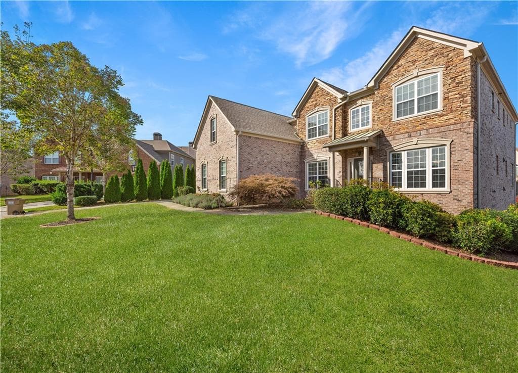 7 bedroom, 5 bathroom, 3,821 sq ft single family residence sold at 5045 Southend Street, Cumming, GA 30041