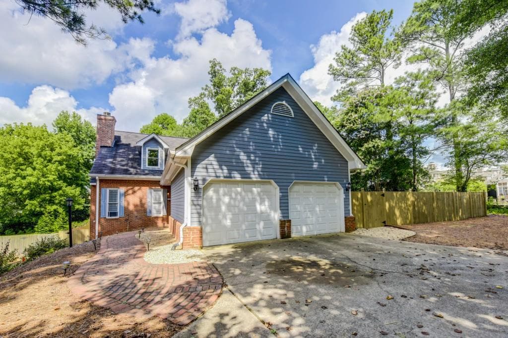 4 bedroom, 4 bathroom, 3,760 sq ft single family residence sold at 5368 Greenland Road, Atlanta, GA 30342