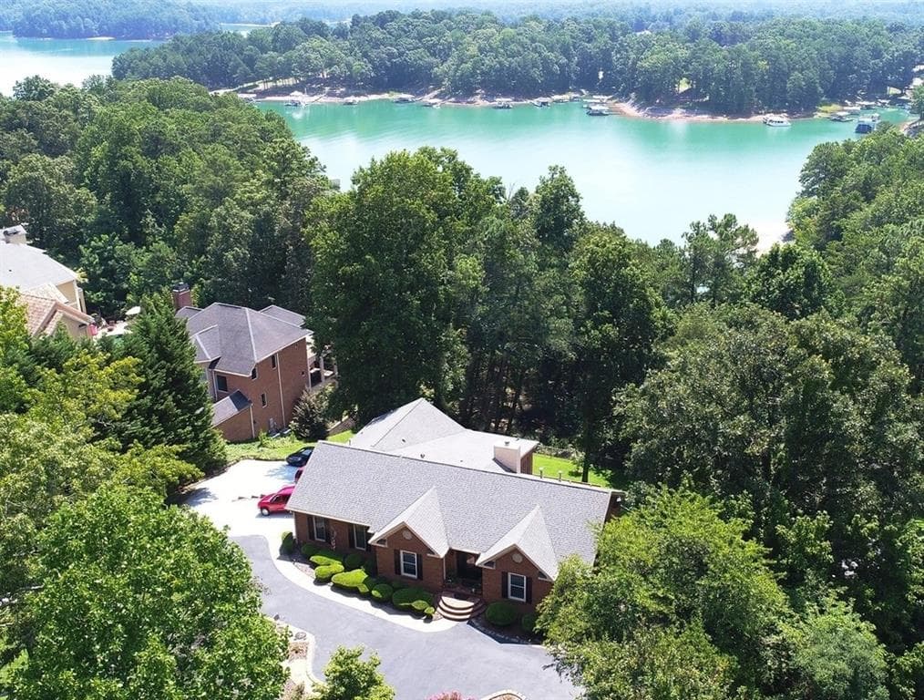 5 bedroom, 4 bathroom, 4,509 sq ft single family residence sold at 6477 Old Shadburn Ferry Road, Buford, GA 30518