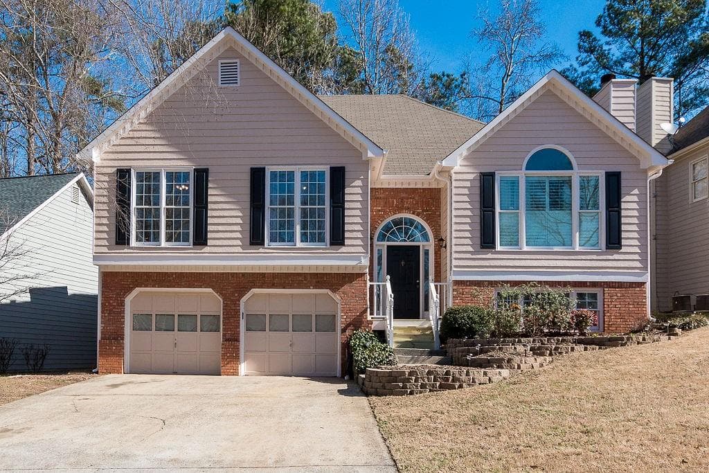 4 bedroom, 3 bathroom, 2,196 sq ft single family residence sold at 408 Middle Valley Lane, Woodstock, GA 30189