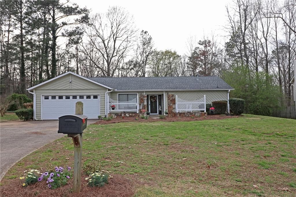 4 bedroom, 3 bathroom, 2,464 sq ft single family residence sold at 6666 Windwood Circle, Douglasville, GA 30135