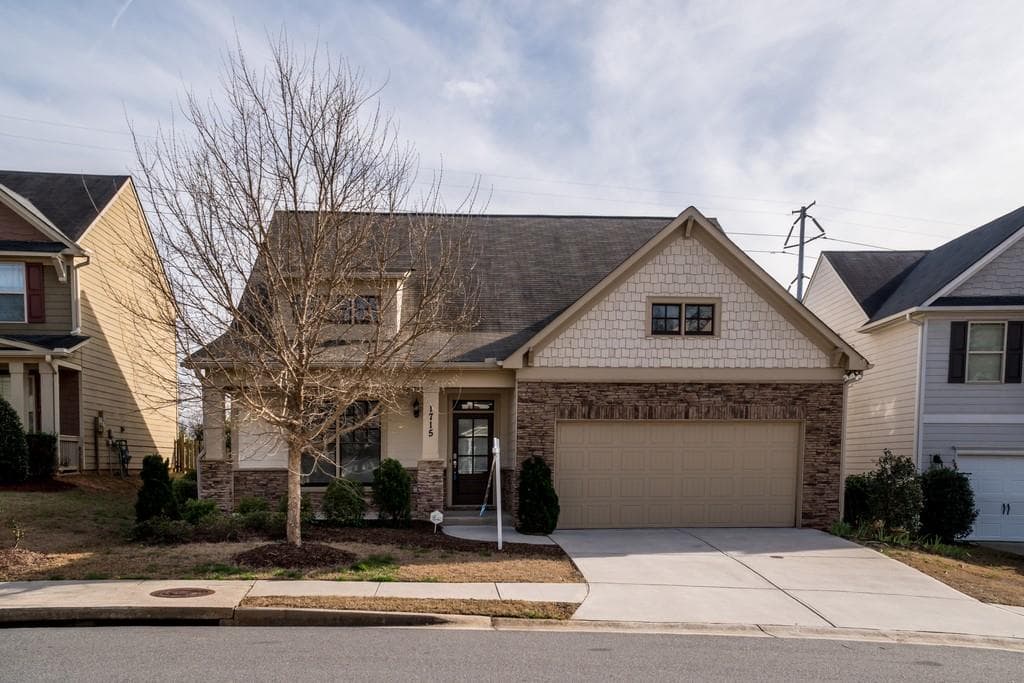 4 bedroom, 3 bathroom, 2,262 sq ft single family residence sold at 1715 Grand Oaks Drive, Woodstock, GA 30188