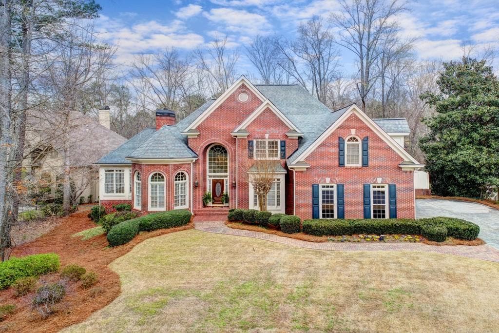 6 bedroom, 6 bathroom, 6,792 sq ft single family residence sold at 9410 Nesbit Lakes Drive, Alpharetta, GA 30022