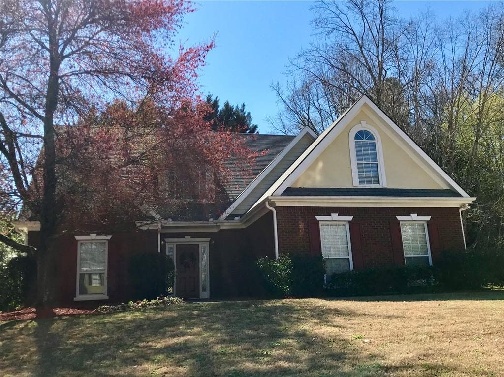 4 bedroom, 3 bathroom, 2,179 sq ft single family residence sold at 165 Roberts Road, Suwanee, GA 30024