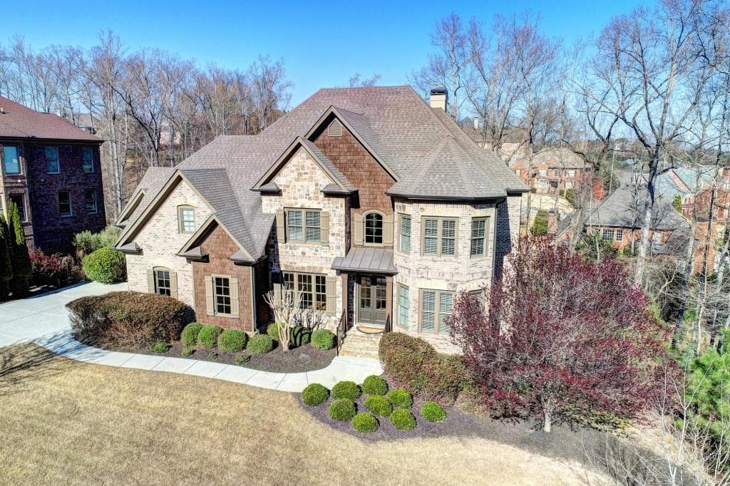 5 bedroom, 4 bathroom, 4,207 sq ft single family residence sold at 4867 Basingstoke Drive, Suwanee, GA 30024
