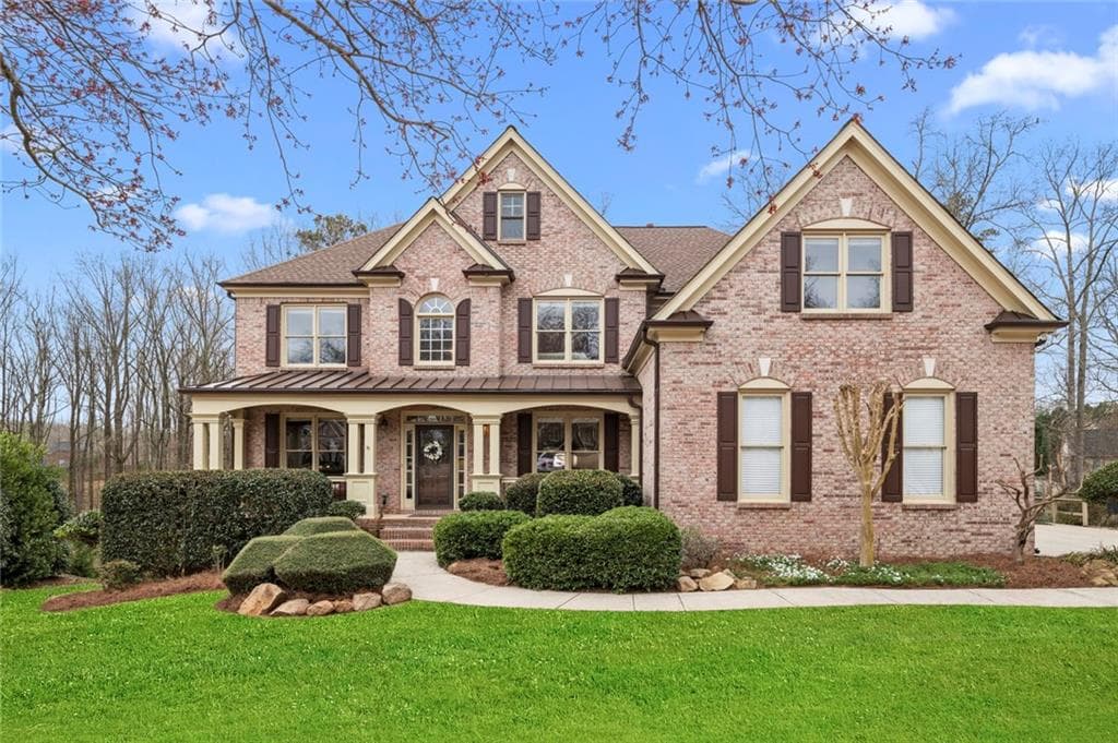 6 bedroom, 5 bathroom, 4,815 sq ft single family residence sold at 920 Ambleside Drive, Suwanee, GA 30024