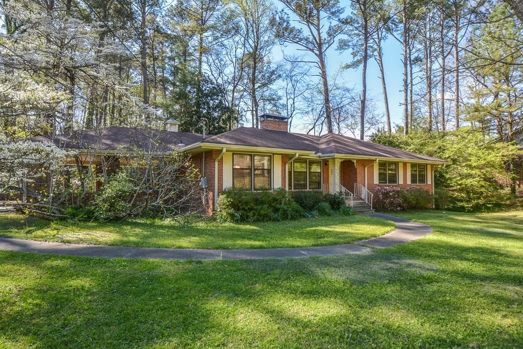 5 bedroom, 3 bathroom, 3,628 sq ft single family residence sold at 1584 Timberland Road, Atlanta, GA 30345