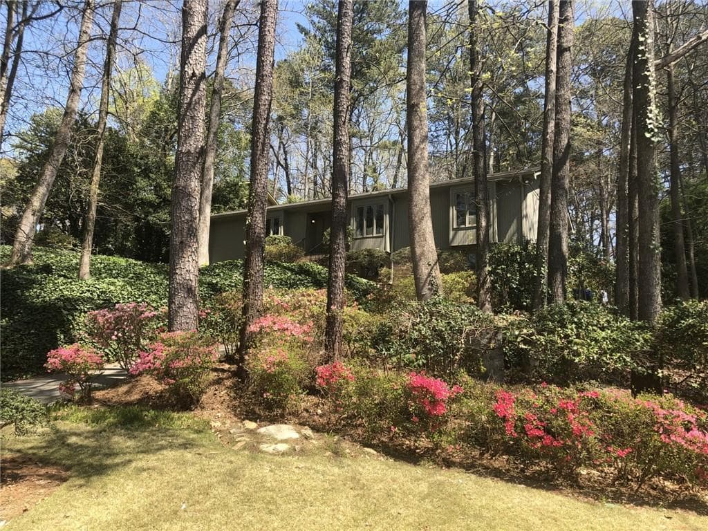 4 bedroom, 4 bathroom, 2,165 sq ft single family residence sold at 2051 Castleway Drive, Atlanta, GA 30345